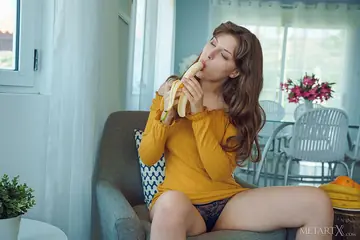 European Brunette Eats a Banana Then Masturbates in Panties