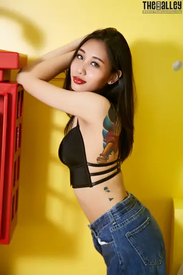 Asian Brunette in Jeans Spreads Her Shaved Pierced Pussy