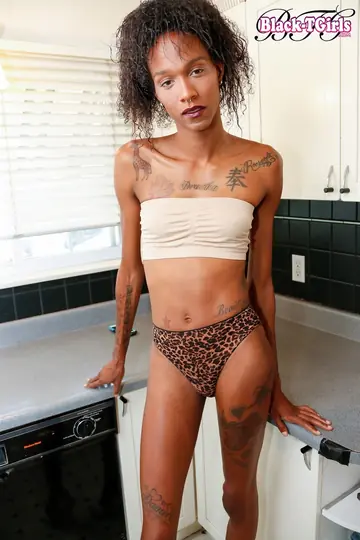 Slim Ebony Trans Woman Undresses and Poses Nude