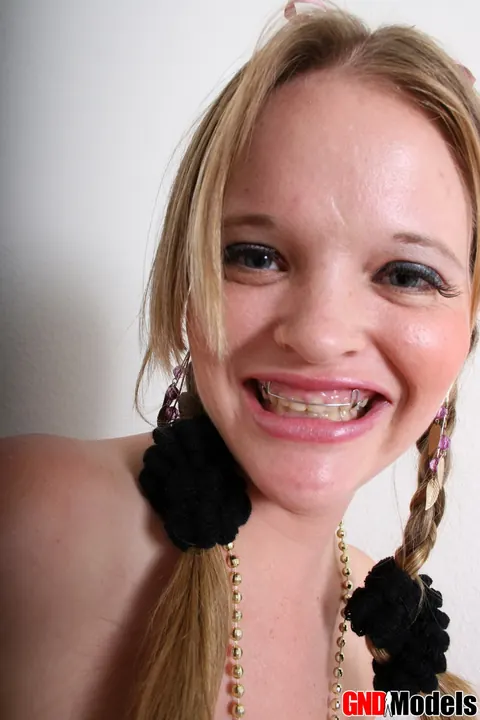 Kissy Darling: Tall Blonde in Pigtails Plays with Her Big Tits in a Skirt – photo 7 of 12