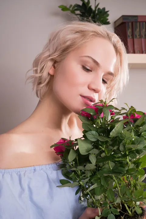 Lilly Mai: Blonde PAWG in a Skirt Poses While Watering Flowers – photo 3 of 21