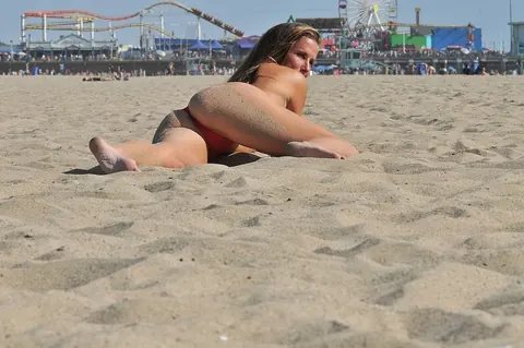 Sofie Marie: Tall Brunette MILF Spreads Her Legs in a Red Bikini on the Beach – photo 12 of 20