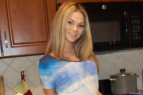 Athena Faris: Tattooed Blonde with Small Natural Tits Strips in the Kitchen – photo 4 of 20