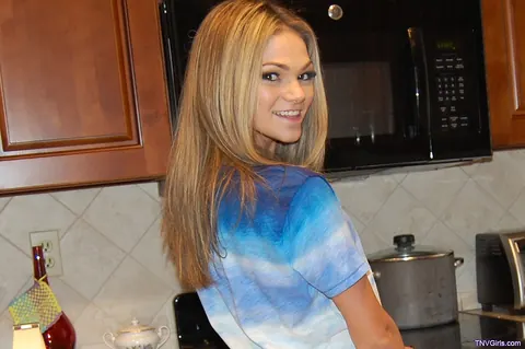 Athena Faris: Tattooed Blonde with Small Natural Tits Strips in the Kitchen – photo 5 of 20