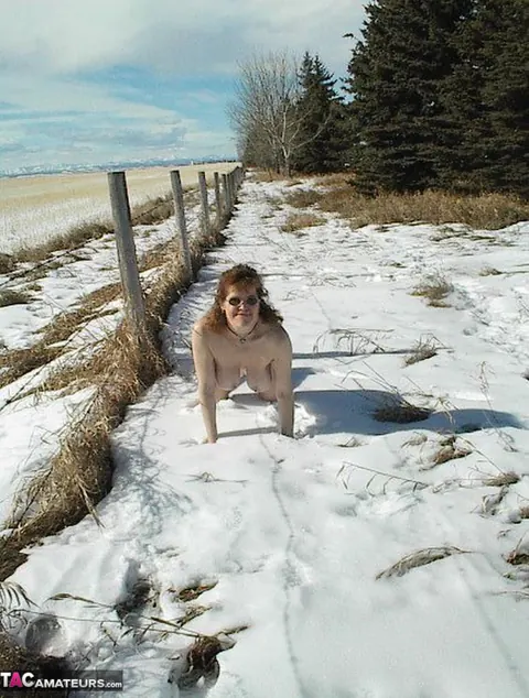 Misha Milf: Mature Redhead BBW Poses Nude Outdoors in the Snow Wearing Glasses – photo 9 of 20