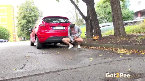 Lara Fox: Thick European Brunette Squats Behind a Car and Spreads Her Legs – photo 4 of 15