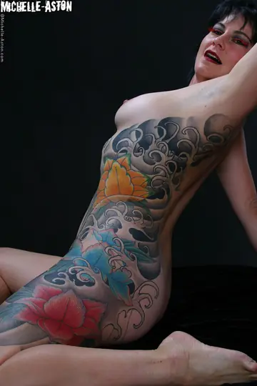 Michelle Aston – Tall Brunette MILF Displays Her Tattooed Body and Big Ass