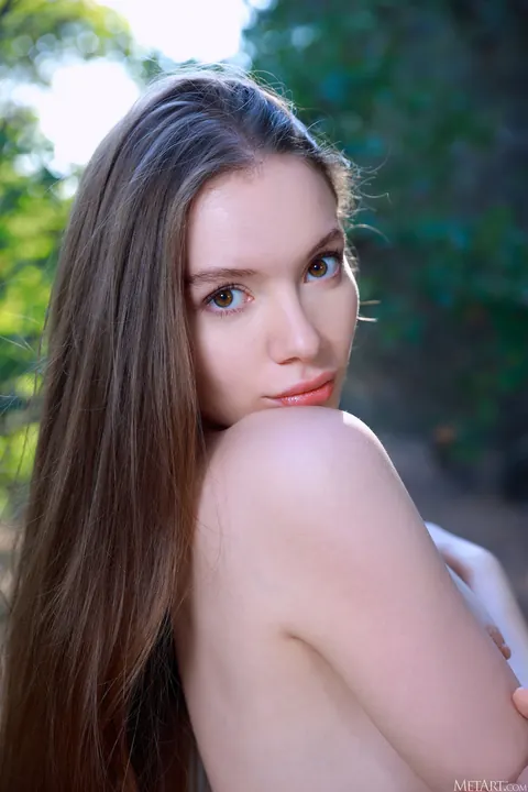 Brunette Strips Out of Her Skirt in the Forest – photo 7 of 21