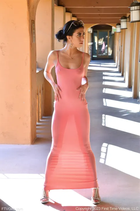 Mila Marie: Slim Brunette in a Tight Dress and Heels Flashes Outdoors – photo 19 of 20