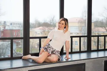 Hairy Woman in Panties Poses on a Table Top