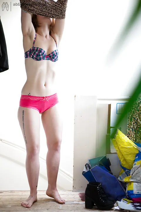 Short-Haired Redhead Fingers Her Hairy Pussy Then Dresses – photo 11 of 16