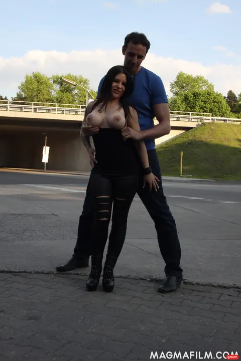 Aviva Rocks: Petite German Brunette Flashes Her Enhanced Tits Outdoors – photo 14 of 15