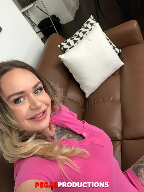 Blonde with Big Enhanced Tits and Tattoos Strips Nude – photo 12 of 20