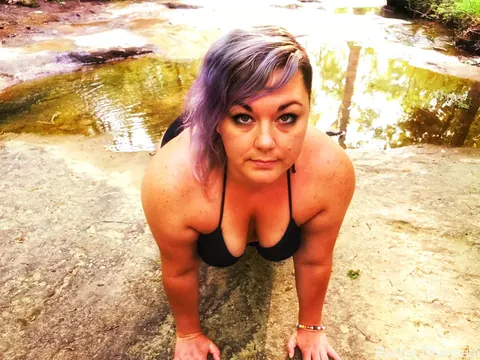 Chubby MILF with Big Tits Poses in a Black Bikini Outdoors – photo 8 of 14