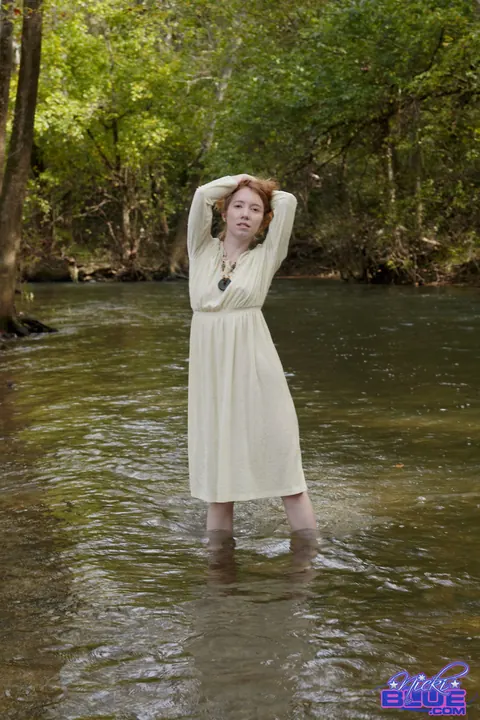 Nicki Blue: Busty Pale Redhead Wades into a Stream in a Skirt – photo 11 of 15