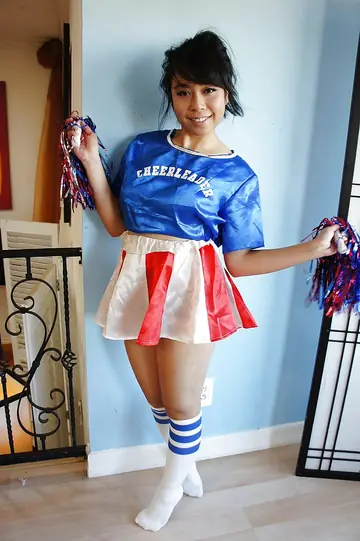 May Lee – Asian Brunette Strips Out of Her Skirt and Socks to Spread Her Shaved Pussy