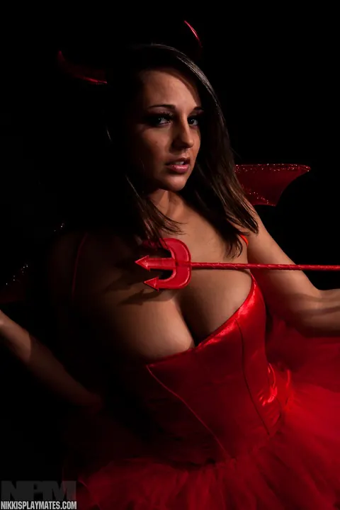 Nikki Sims: Busty Brunette MILF Reveals Stockings in Halloween Costume – photo 5 of 15