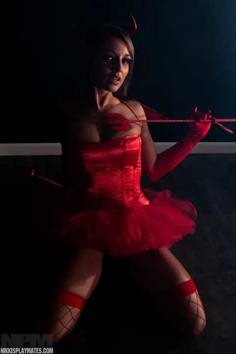 Nikki Sims: Busty Brunette MILF Reveals Stockings in Halloween Costume – photo 3 of 15
