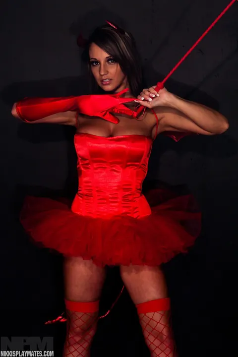 Nikki Sims: Busty Brunette MILF Reveals Stockings in Halloween Costume – photo 4 of 15