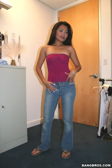 Asian Brunette in Jeans Gives a Handjob and Gets Fucked