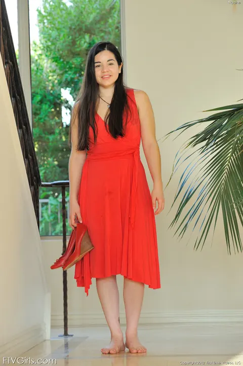 Nadine Sage: Thick Latina in a Red Dress Pulls It Up and Spreads Her Shaved Pussy – photo 1 of 15