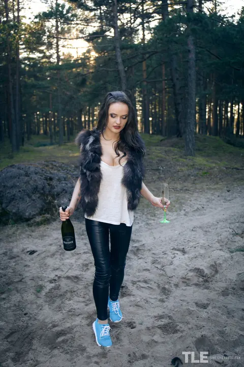 Maria Z: Brunette in Leather Yoga Pants Uses a Wine Bottle Deep in Her Pussy – photo 16 of 16
