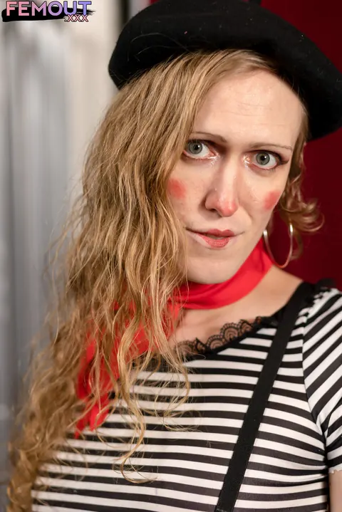 Trans Woman Undresses and Poses on Her Knees Arching Back – photo 1 of 16