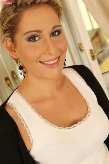 Czech Blonde with Natural Tits and Tattoo Strips Nude