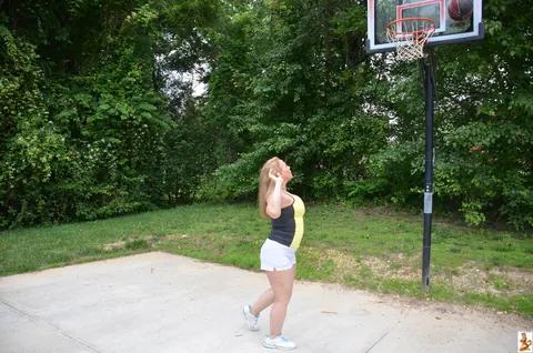 Stunning Summer: Mature Blonde with Big Tits Poses in a Skirt Over Shorts Outdoors – photo 15 of 15