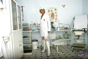 Miluse Havelova – Thick Mature Nurse in Stockings Spreads Her Shaved Pussy