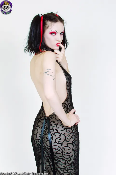 Scar 13: Brunette with Natural Tits Strips and Poses in High Heels – photo 2 of 15