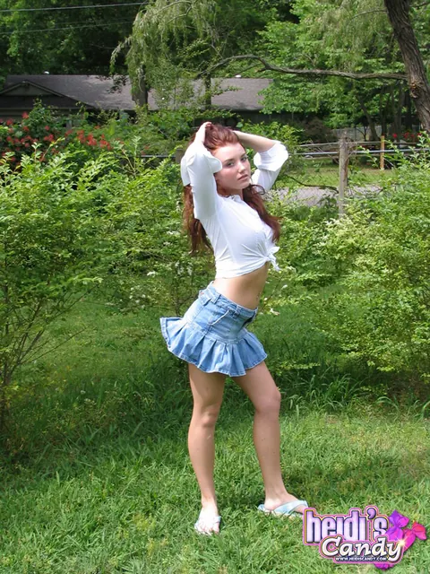 Thick Amateur Covers Her Big Tits in a Skirt on the Lawn – photo 2 of 12
