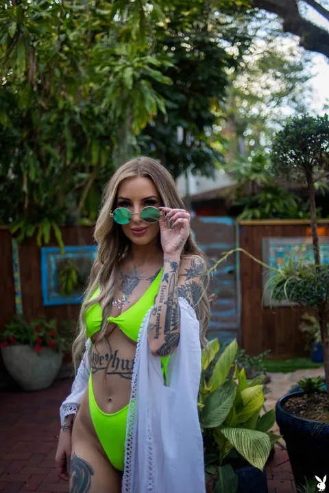 Tattooed Babe in a Bikini and Glasses Spreads Outdoors – photo 2 of 20