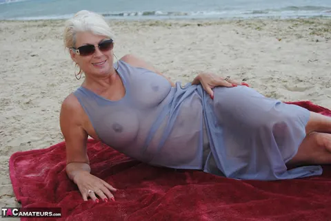 Blonde MILF Models a Sheer Dress on the Beach – photo 12 of 19