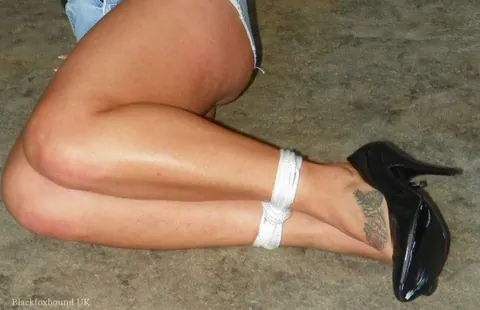 Thick Redhead Hogtied in Denim Shorts and Heels Spreads Her Ass – photo 6 of 14