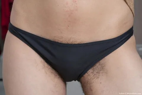 Short-Haired Woman in a Skirt Fingers Her Hairy Ass – photo 4 of 16