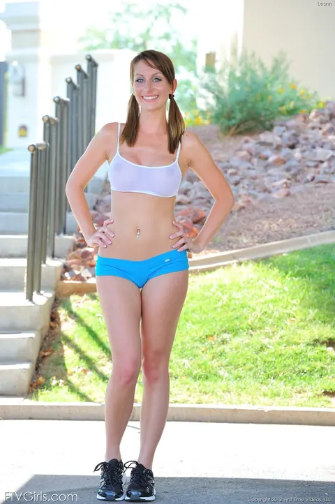 Athletic MILF Strips Out of Her Shorts in the Forest – photo 7 of 17