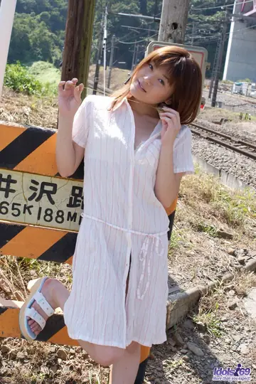 Kyoko Nakajima – Japanese Brunette Pulls Panties Aside on Rail Tracks