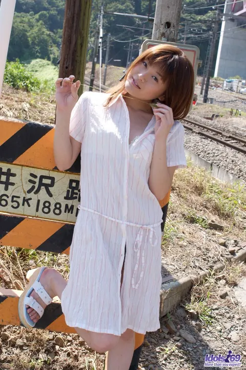 Kyoko Nakajima: Japanese Brunette Pulls Panties Aside on Rail Tracks – photo 1 of 15