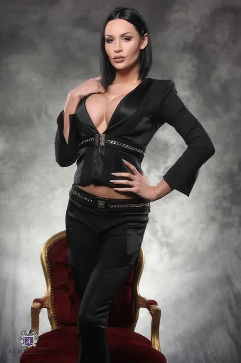 Busty Trans Woman Poses Nude in Heels and Bares Her Chest – photo 2 of 16