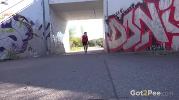 European Blonde MILF Pisses by a Graffiti Wall in Pantyhose