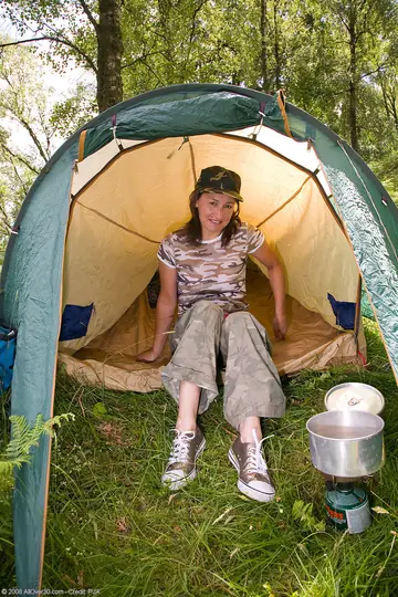 Brunette MILF Undresses and Spreads Outdoors at a Camping Site