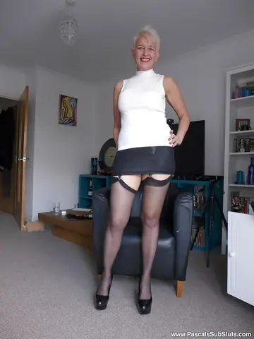 Mature Blonde in Lingerie Spreads Her Shaved Pussy Wide