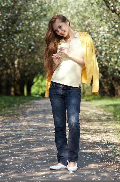 Skinny Woman Strips Out of Her Jeans Outdoors – photo 1 of 21