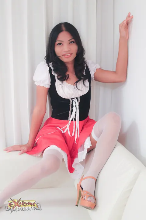 Black-Haired Asian Trans Woman Undresses for Anal on the Sofa – photo 3 of 21