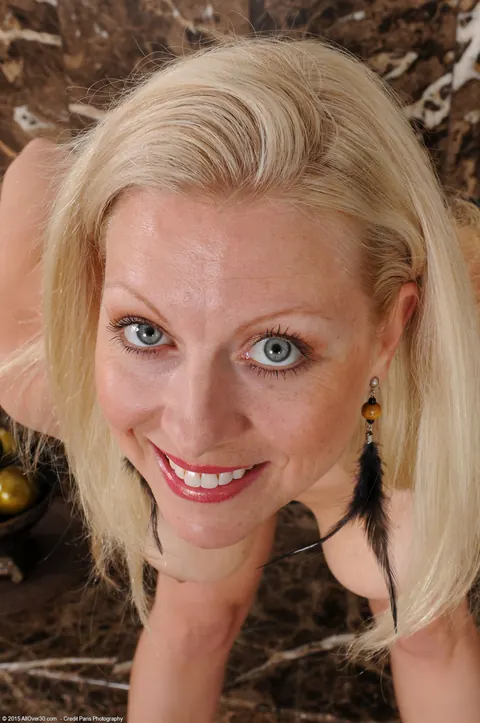 Zoey Tyler: Busty Blonde MILF Strips Nude by the Fireplace – photo 7 of 20