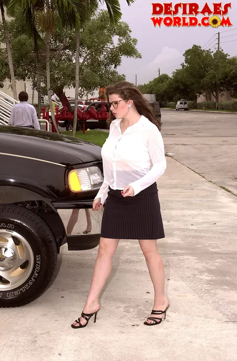 Desirae: Curvy MILF in a Skirt and Glasses Exposes Her Huge Tits Outdoors – photo 1 of 20