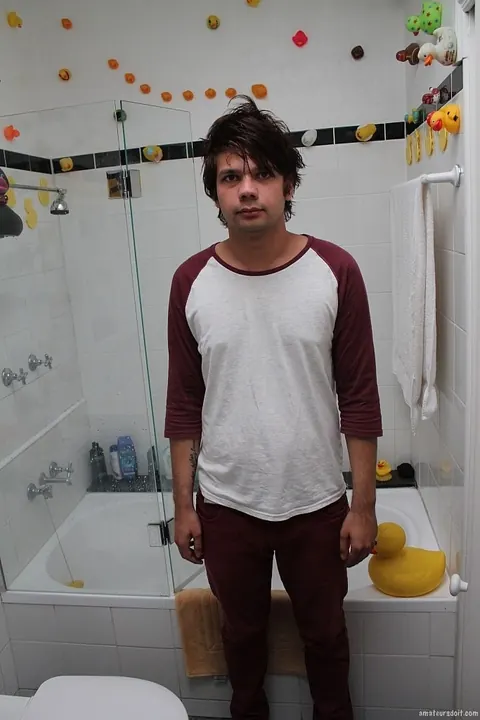 Man Strips Nude and Shows Off in the Bathroom – photo 4 of 21