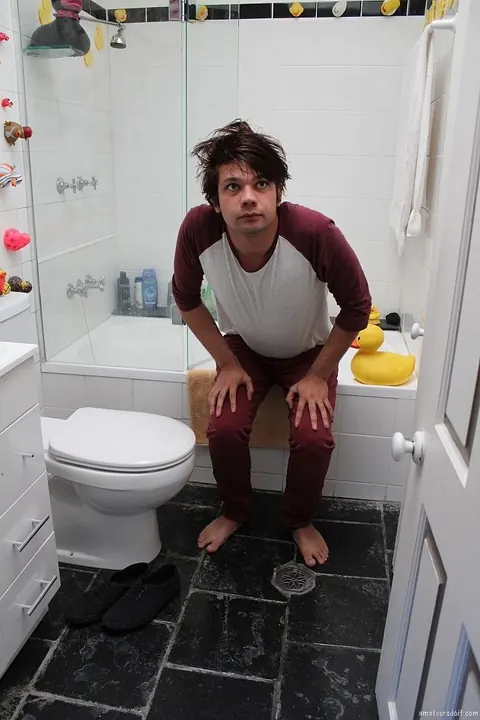 Man Strips Nude and Shows Off in the Bathroom – photo 6 of 21