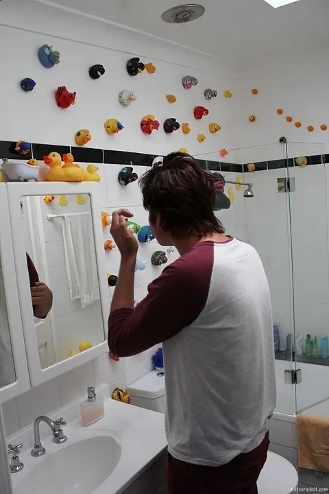 Man Strips Nude and Shows Off in the Bathroom – photo 5 of 21